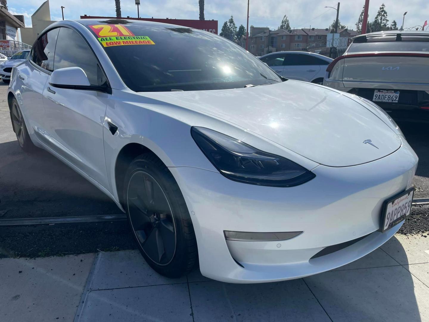 2021 WHITE /BLACK Tesla Model 3 Long Range (5YJ3E1EB8MF) with an ELECTRIC engine, 1A transmission, located at 744 E Miner Ave, Stockton, CA, 95202, (209) 944-5770, 37.956863, -121.282082 - PLUS TAXES AND FEES- Photo#1